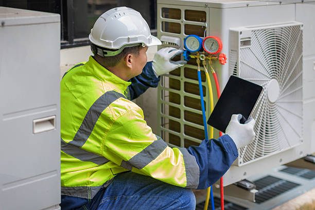 Professional Heat Pump Repair technician working in Rockwood, TX